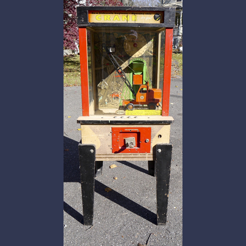 Vintage penny arcade crane digger skill game . Dig for a prize 