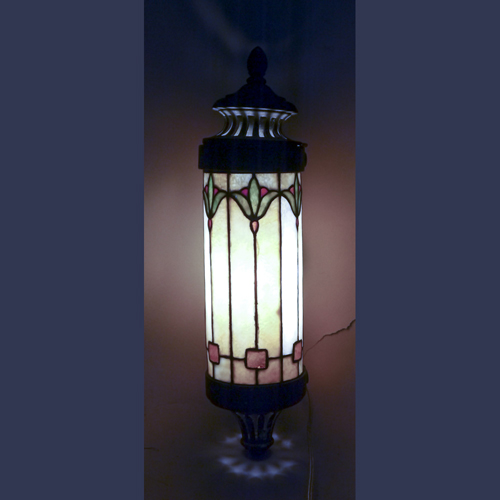 Antique leaded stained glass sconce from a steam train parlor car.