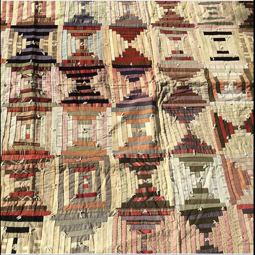 Antique hand stitched quilts and blankets